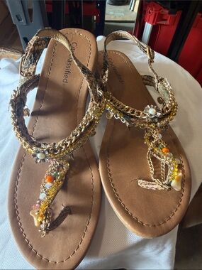 Classified Brown Beaded T-Strap Sandals with Gold Chain Accents